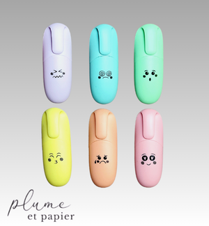 Collection de six mini surligneurs qui ont des emojis variant de la confusion à la joie.